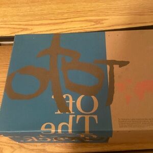 OTBT sandles. Never been worn kind of a army green to a brown color